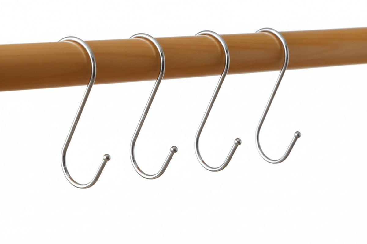 hooks on a rod against white background