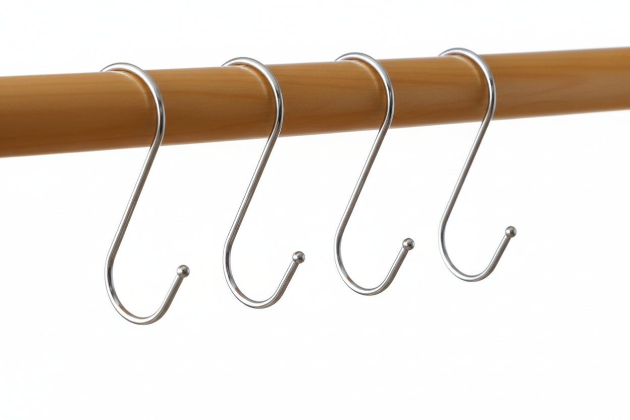 hooks on a rod against white background